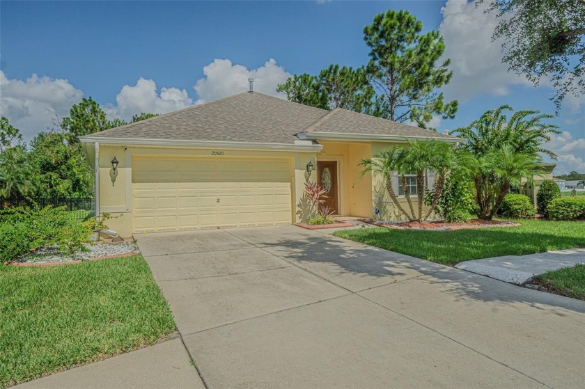 Welcome to this beautifully maintained 4-bedroom, 3-bath, 2-car - Beach Home for sale in Tampa, Florida on Beachhouse.com