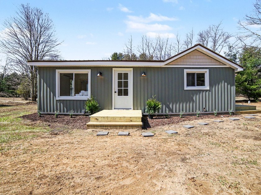 Experience the luxury of new construction without the wait at - Beach Home for sale in Montague, Michigan on Beachhouse.com