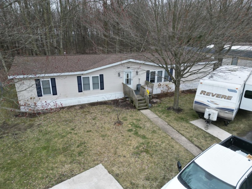 Welcome to 1281 Pontaluna Rd, Lot 132 in Pontaluna Shores - Beach Home for sale in Norton Shores, Michigan on Beachhouse.com