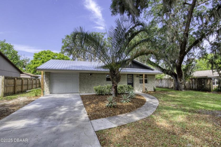 Welcome to this beautifully renovated single-family home - Beach Home for sale in Edgewater, Florida on Beachhouse.com