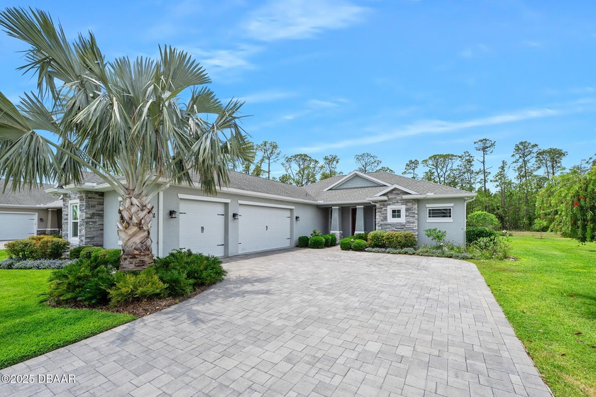Offering stunning day and nighttime curb appeal, this 1916 sf, 3 - Beach Home for sale in New Smyrna Beach, Florida on Beachhouse.com