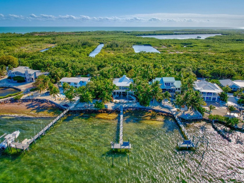 Nestled in the heart of Grassy Key, this extraordinary home - Beach Home for sale in Marathon, Florida on Beachhouse.com