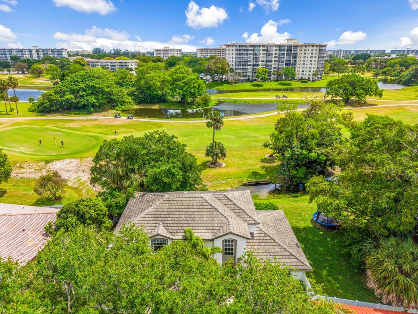 Beautifully remodeled home on a double lot in the gated - Beach Home for sale in Pompano Beach, Florida on Beachhouse.com