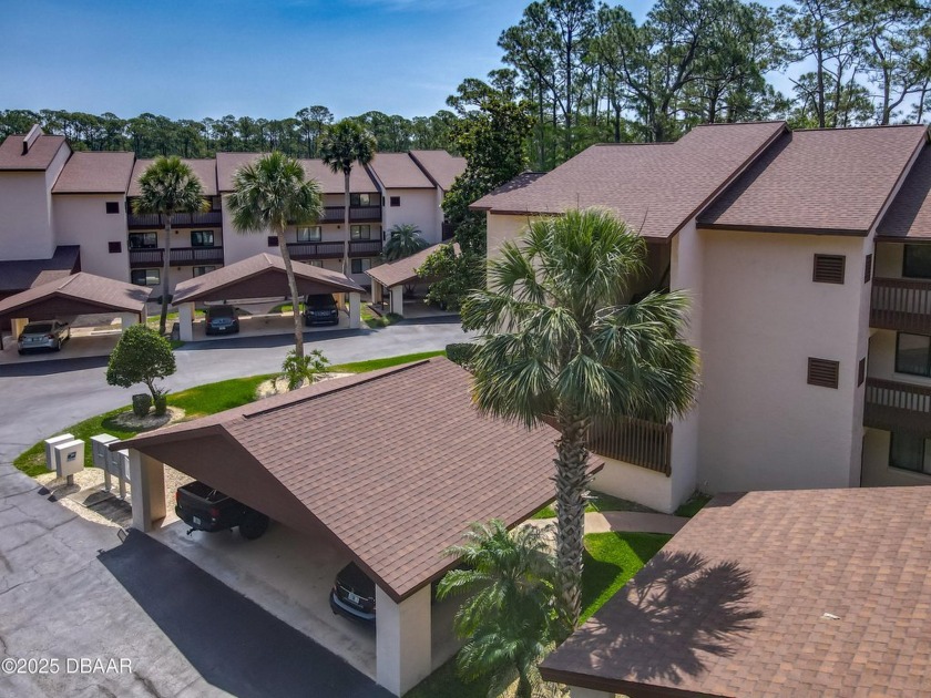 This 3 bedroom 2 bath end corner unit is nestled on the top - Beach Condo for sale in Daytona Beach, Florida on Beachhouse.com
