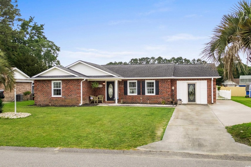 Welcome to 4639 Mandi Ave, a charming all-brick ranch nestled in - Beach Home for sale in Little River, South Carolina on Beachhouse.com