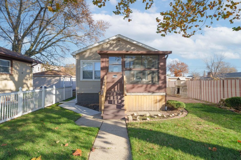 Welcome to this beautifully renovated bungalow in the heart of - Beach Home for sale in Whiting, Indiana on Beachhouse.com