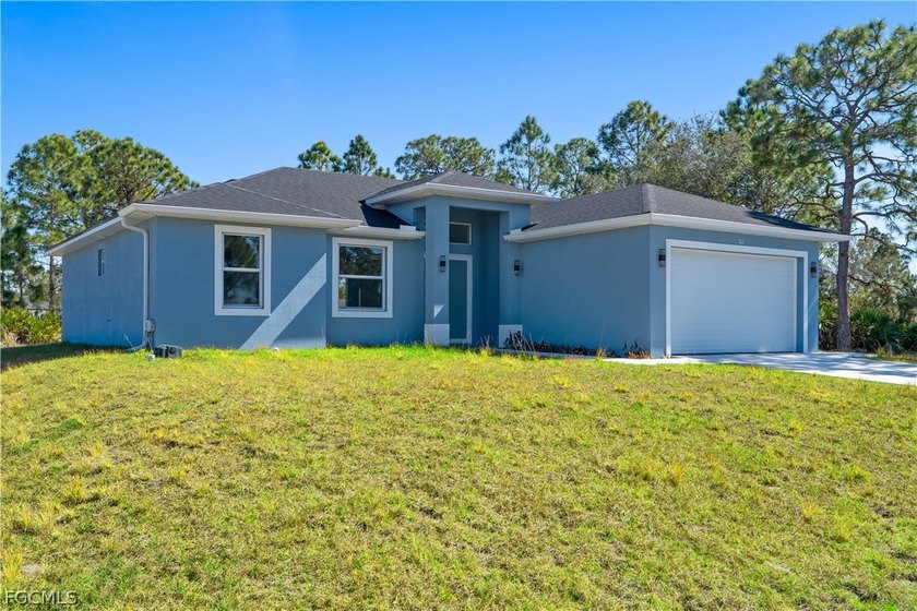 JUST LISTED! Don't miss this beautiful new construction home - Beach Home for sale in Lehigh Acres, Florida on Beachhouse.com