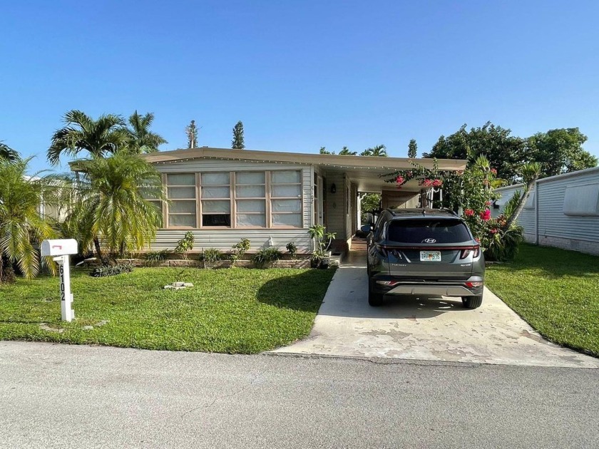 This stunning 2-bedroom, 2-bathroom home with a bonus room is - Beach Home for sale in Margate, Florida on Beachhouse.com