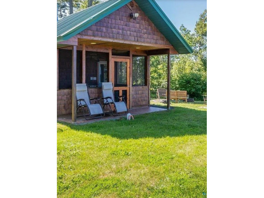 Fabulous and rare opportunity to own an adorable cabin on Lake - Beach Acreage for sale in Port Wing, Wisconsin on Beachhouse.com