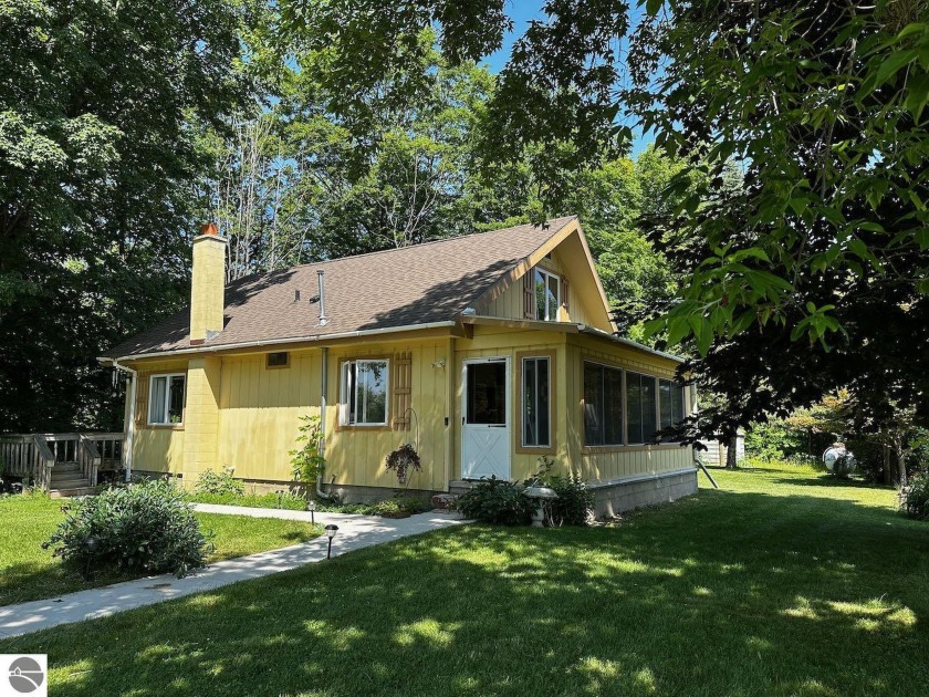 This charming 2-bedroom 1 bath home, with a 30'x40' heated pole - Beach Home for sale in Kewadin, Michigan on Beachhouse.com