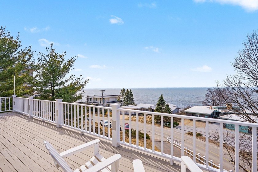 RELAX and ENJOY SPECTACULAR SUNSETS from 4 decks (1400sf) at - Beach Home for sale in Spring Lake, Michigan on Beachhouse.com