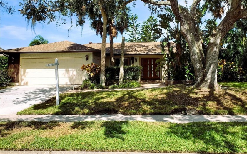 PRICE ADJUSTMENT! A wonderful pool home located in East Lake - Beach Home for sale in Oldsmar, Florida on Beachhouse.com