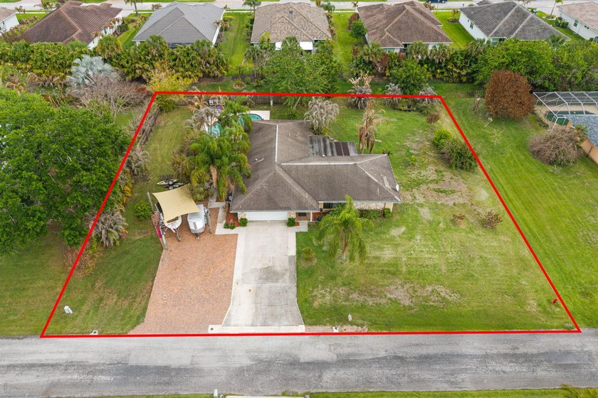 A DIAMOND IN THE ROUGH is this spacious CBS Pool home situated - Beach Home for sale in Vero Beach, Florida on Beachhouse.com