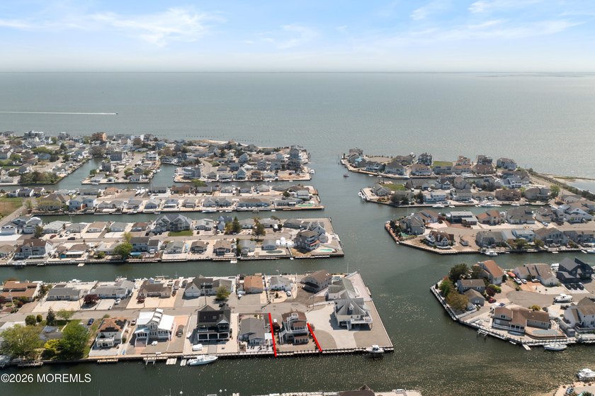 Welcome to 1218 Gemini Ct! Situated on a deep lagoon with no - Beach Home for sale in Forked River, New Jersey on Beachhouse.com