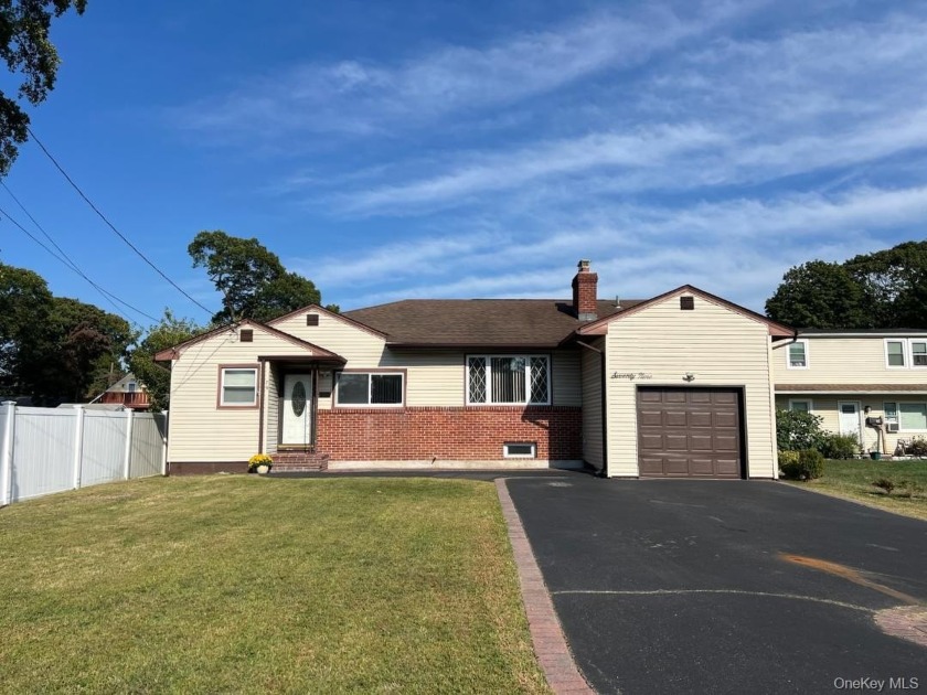 This Lovely Custom Split Level Home boasts, sunny light filled - Beach Home for sale in Babylon, New York on Beachhouse.com