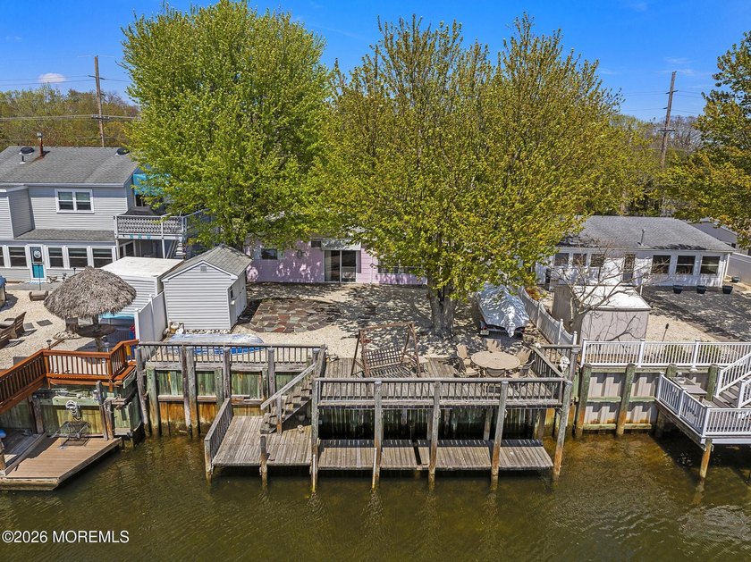 DOCK AT YOUR DECK! SPOTLIGHT ON VALUE...in this gracefully - Beach Home for sale in Beach Haven West, New Jersey on Beachhouse.com