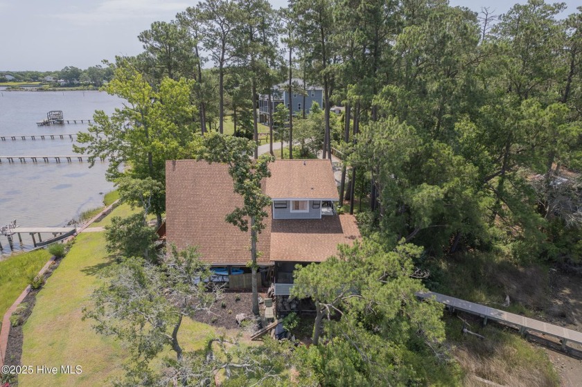 Welcome to this unique waterfront escape in Sneads Ferry! Tucked - Beach Home for sale in Sneads Ferry, North Carolina on Beachhouse.com