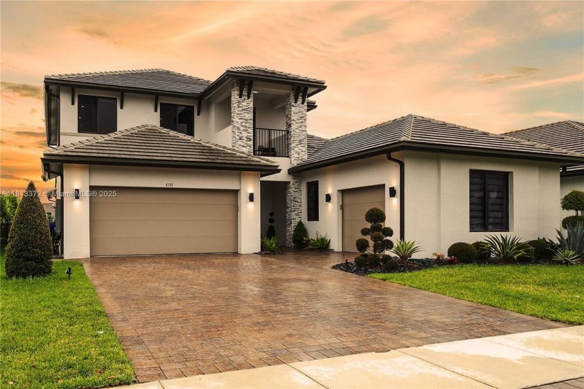 Experience luxury living in this impeccable 5BD/4BA lakefront - Beach Home for sale in Miramar, Florida on Beachhouse.com