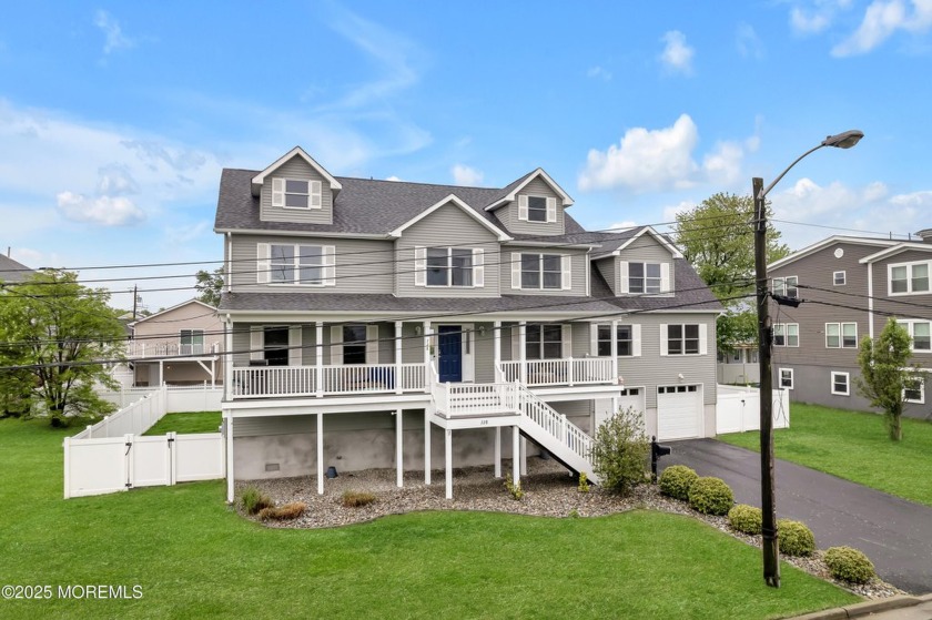 Step into beachside luxury with this 5-bedroom, 3-bath colonial - Beach Home for sale in Union Beach, New Jersey on Beachhouse.com