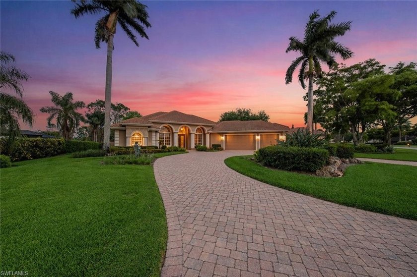 Situated on an impressive half-acre homesite, surrounded by lush - Beach Home for sale in Estero, Florida on Beachhouse.com