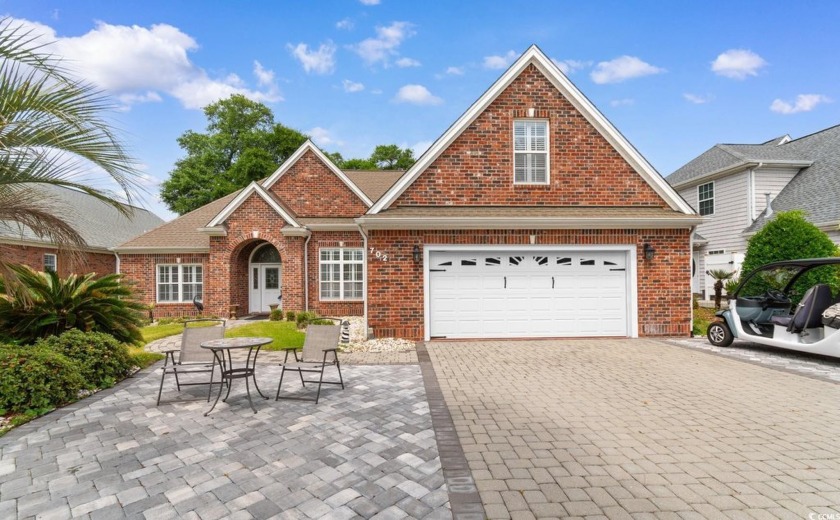Welcome to 702 Compass Pointe Drive, a stunning all-brick - Beach Home for sale in North Myrtle Beach, South Carolina on Beachhouse.com