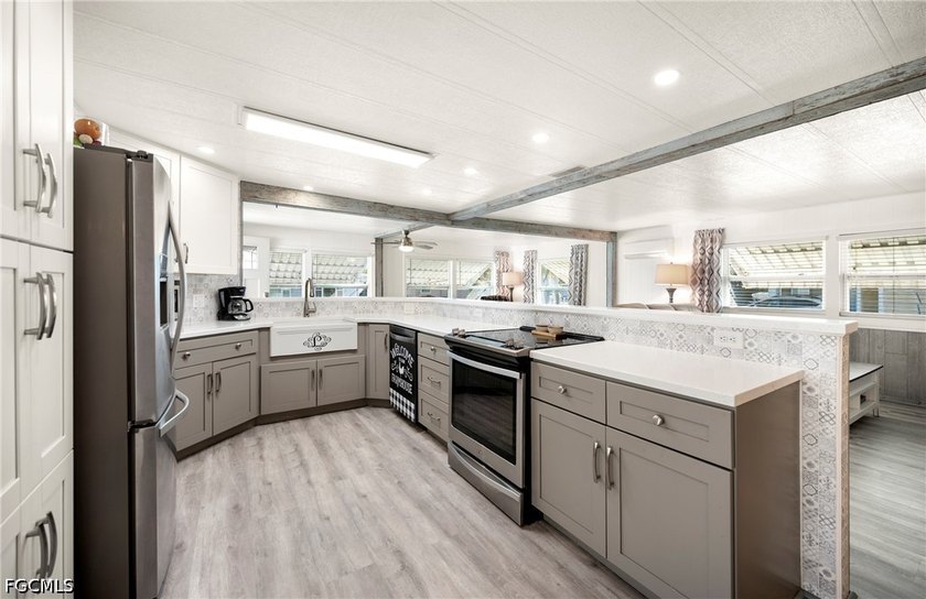 Nestled in the gated, 55+ boating community of Old Bridge - Beach Home for sale in North Fort Myers, Florida on Beachhouse.com