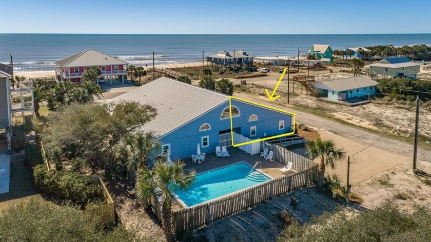 Step into the perfect beach getaway with this charming 2 bedroom - Beach Condo for sale in St. George Island, Florida on Beachhouse.com