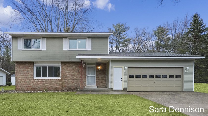 Move in ready and full of charm! This 4 bedroom, 2 bath home in - Beach Home for sale in Muskegon, Michigan on Beachhouse.com