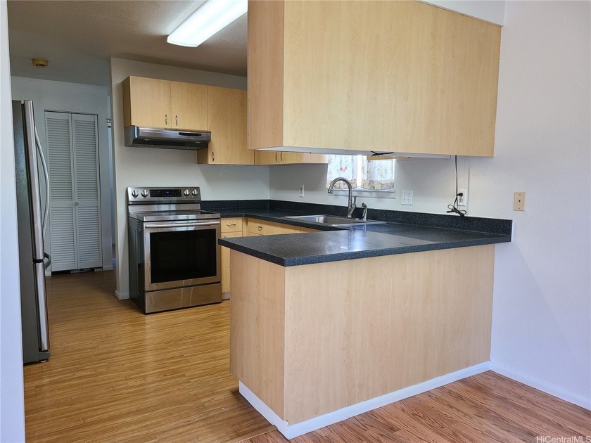 Stand alone two story spacious home in the Moiliili/McCully - Beach Condo for sale in Honolulu, Hawaii on Beachhouse.com