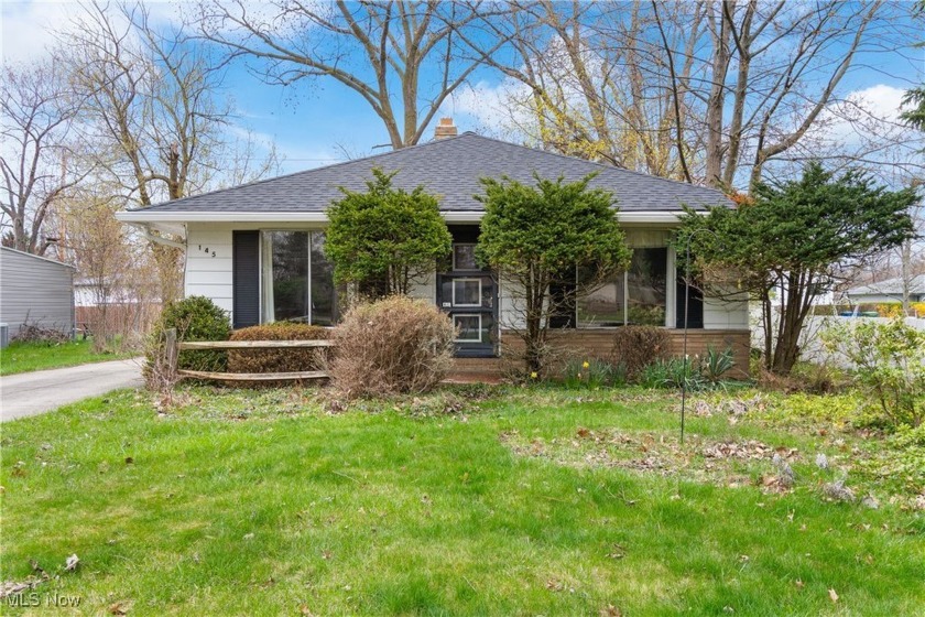 Welcome to this cozy ranch nestled on a beautiful wooded lot in - Beach Home for sale in Eastlake, Ohio on Beachhouse.com