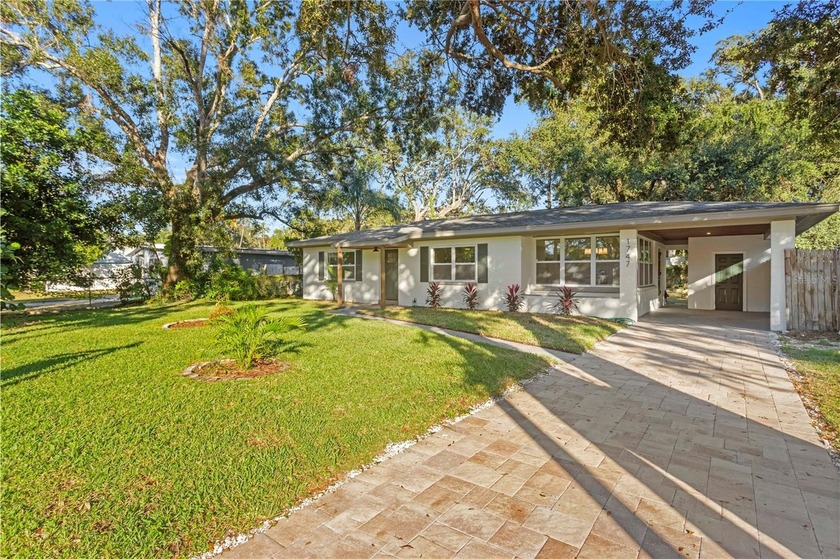 This fully remodeled 2 bedroom, 1.5 bathroom single story home - Beach Home for sale in Dunedin, Florida on Beachhouse.com