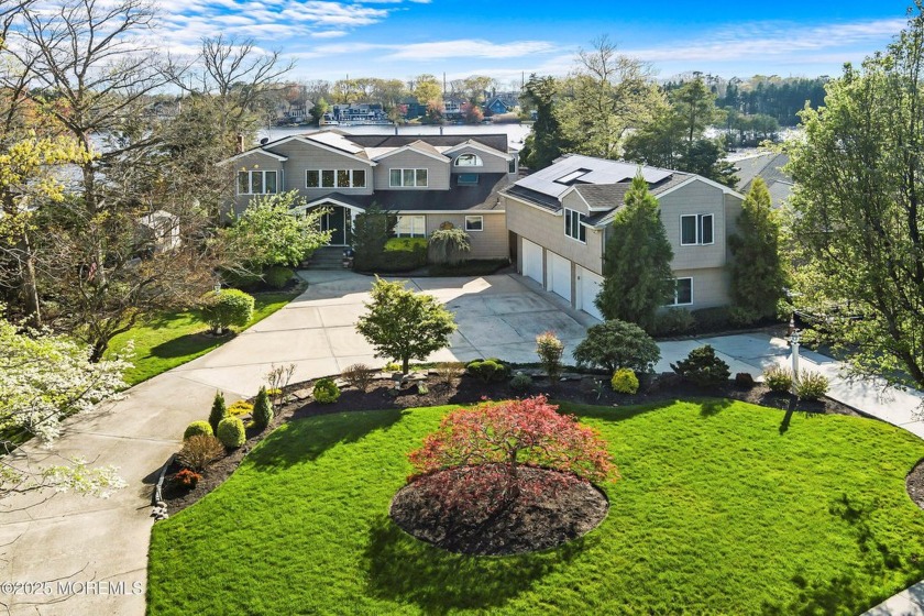 A rare opportunity to own on vibrant Manahawkin Lake! This 5BR - Beach Home for sale in Manahawkin, New Jersey on Beachhouse.com