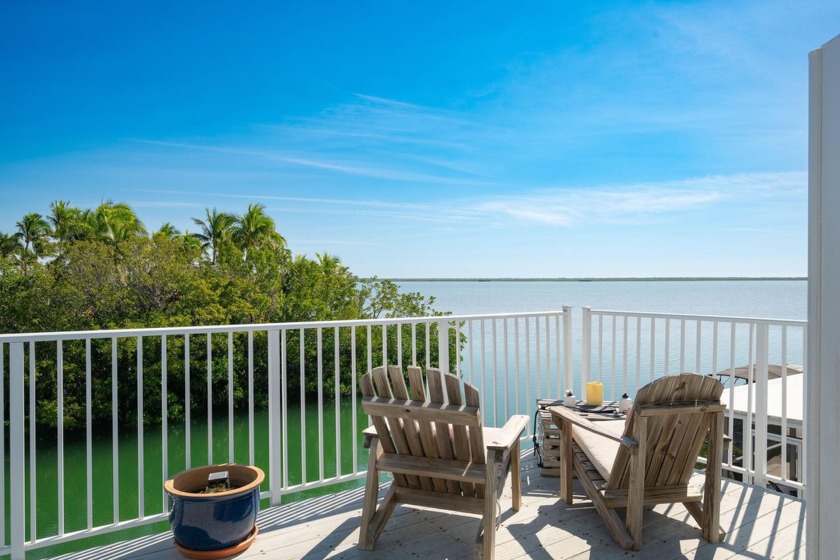 NEW LISTING!  WATERFRONT canal home with open water views, this - Beach Home for sale in Saddlebunch, Florida on Beachhouse.com
