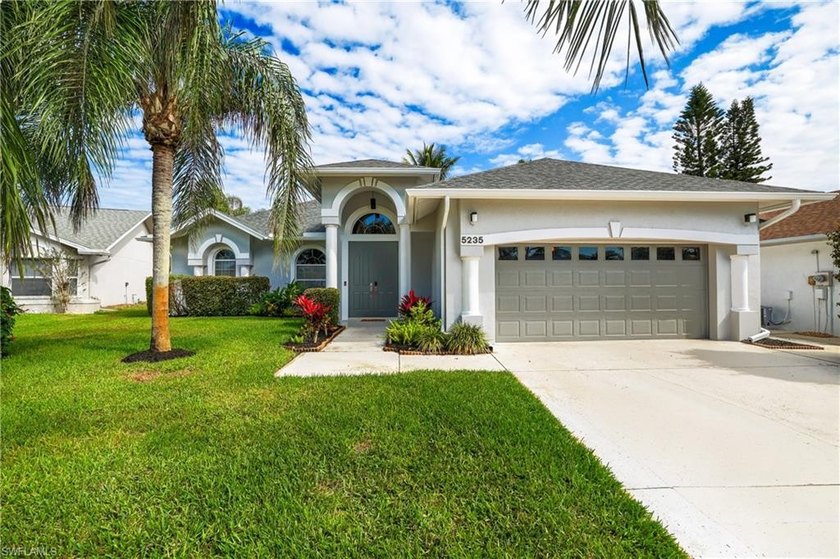 Offered furnished, this lakefront residence is ideally - Beach Home for sale in Naples, Florida on Beachhouse.com