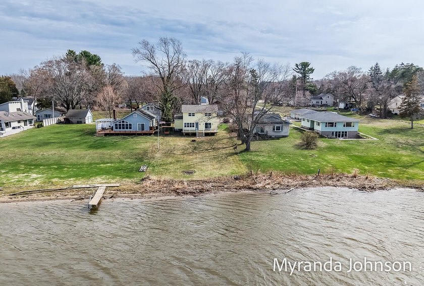 Waterfront Living at Its Best! This charming, updated 3 bedroom - Beach Home for sale in Grand Haven, Michigan on Beachhouse.com