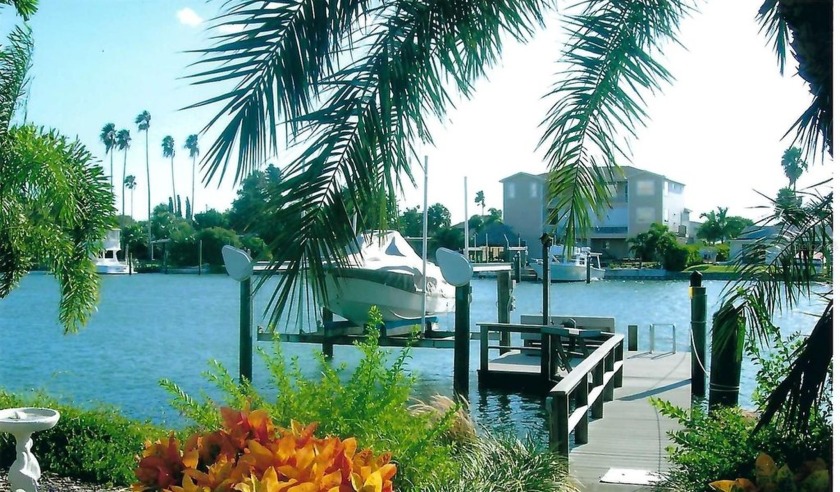 Located on prime waterfront, this two-bedroom, two bathroom, two - Beach Home for sale in Madeira Beach, Florida on Beachhouse.com