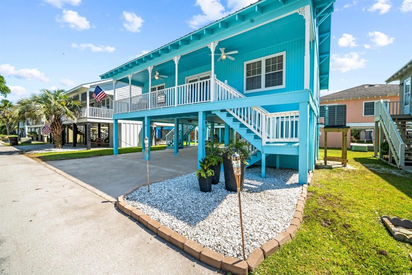 Pack your bags for the Summer House! This charming, beautifully - Beach Home for sale in Garden City Beach, South Carolina on Beachhouse.com