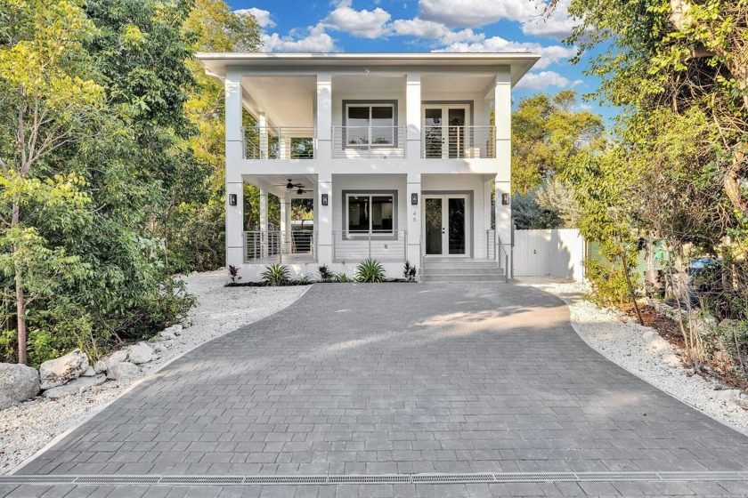 Welcome to this stunning new construction home offering modern - Beach Home for sale in Key Largo, Florida on Beachhouse.com