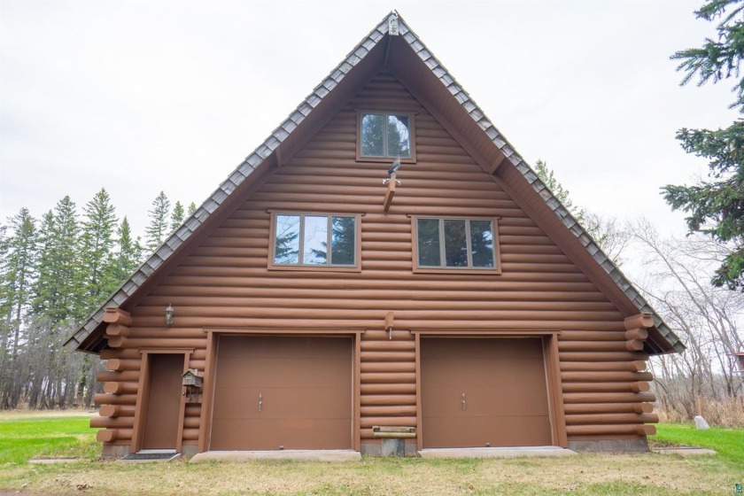 Nestled along Lake Superior South Shore  this hand-planed  White - Beach Home for sale in Herbster, Wisconsin on Beachhouse.com