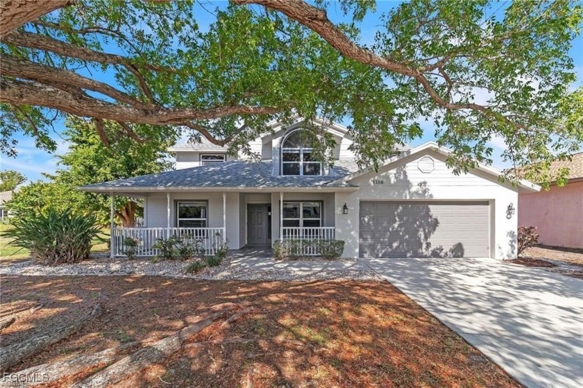 Welcome home to this inviting two-story retreat in Cape Coral! - Beach Home for sale in Cape Coral, Florida on Beachhouse.com