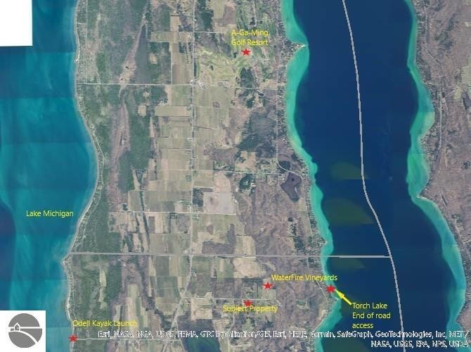 Discover a rare opportunity to own 3.4 pristine acres of vacant - Beach Acreage for sale in Kewadin, Michigan on Beachhouse.com