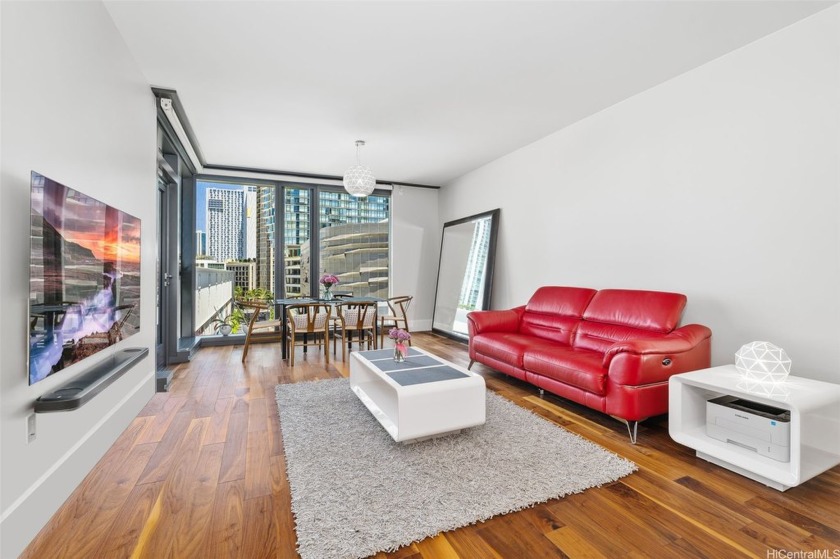 Step into a world of refined living in this beautiful 1-bedroom - Beach Condo for sale in Honolulu, Hawaii on Beachhouse.com