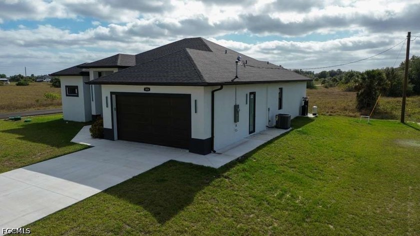 Beautiful and spacious corner-lot property located in one of the - Beach Home for sale in Lehigh Acres, Florida on Beachhouse.com