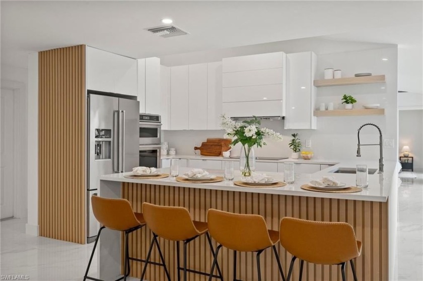 Completely renovated, this stunning canalfront home in the - Beach Home for sale in Naples, Florida on Beachhouse.com