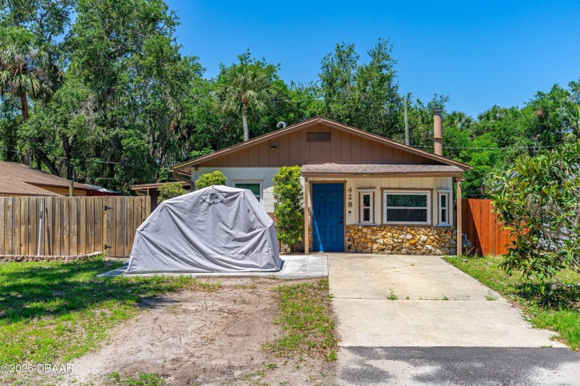 This conviently located 3-bedroom concrete block home, that has - Beach Home for sale in Edgewater, Florida on Beachhouse.com