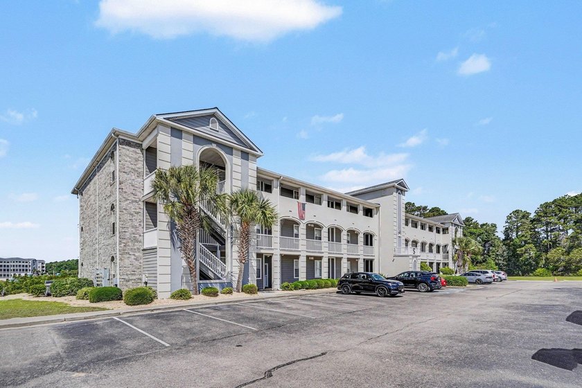 This spacious third-floor end unit offers three bedrooms and two - Beach Condo for sale in Little River, South Carolina on Beachhouse.com