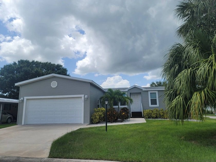 This well-kept double wide 3 bedrooms & 2 baths is a 2019 Palm - Beach Home for sale in Vero Beach, Florida on Beachhouse.com