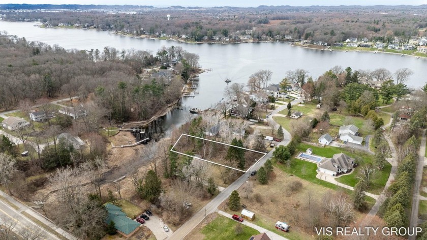 RARE building site situated on an inlet of Spring Lake ! This - Beach Lot for sale in Spring Lake, Michigan on Beachhouse.com