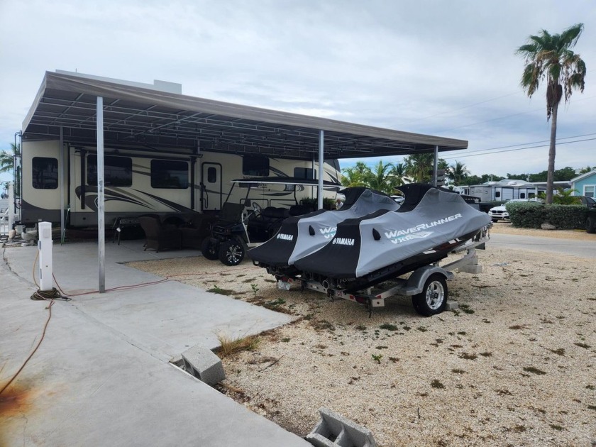 Bay views and a rare double lot! This 3,165 sq. ft. corner RV - Beach Home for sale in Key Largo, Florida on Beachhouse.com