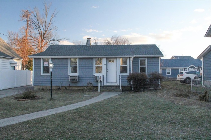 Cozy bungalow ready for your personal touches.  Situated on a - Beach Home for sale in Freeport, New York on Beachhouse.com